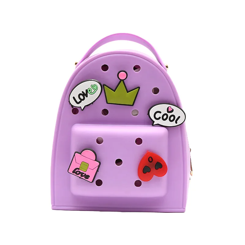 

Trendy Plain Pierce Backpack With Cartoon Accessories Silicone Kids School Bags