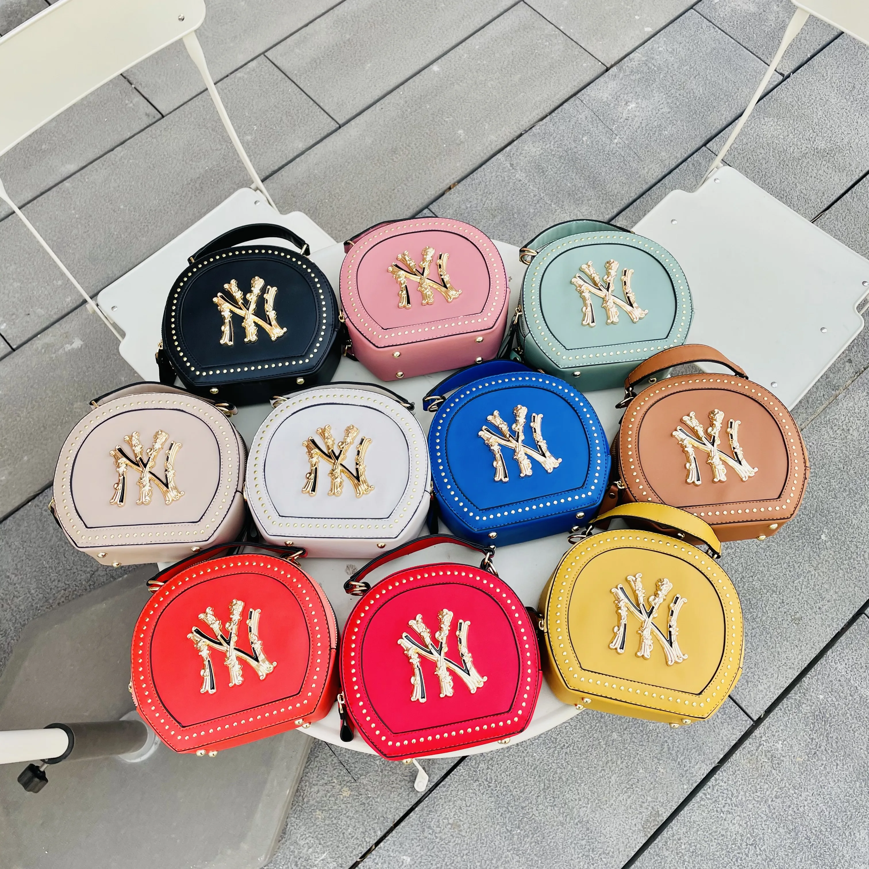 

NY Cross shoulder bag American retro small round bag fashion rivet western style versatile handbag
