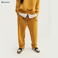 

High Quality New Design Popular Retro Hip Hop Loose Mens Blank Drawstring Track Pants