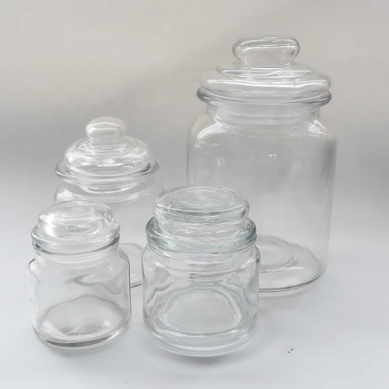 

High quality  clear glass candy sugar coffee herbal tea leaf packing storage jar with glass lid