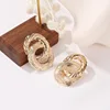 Punk Style Alloy Gold Plated Surround "8" shape Double Stud Guangzhou Wholesale Round Earring Designs