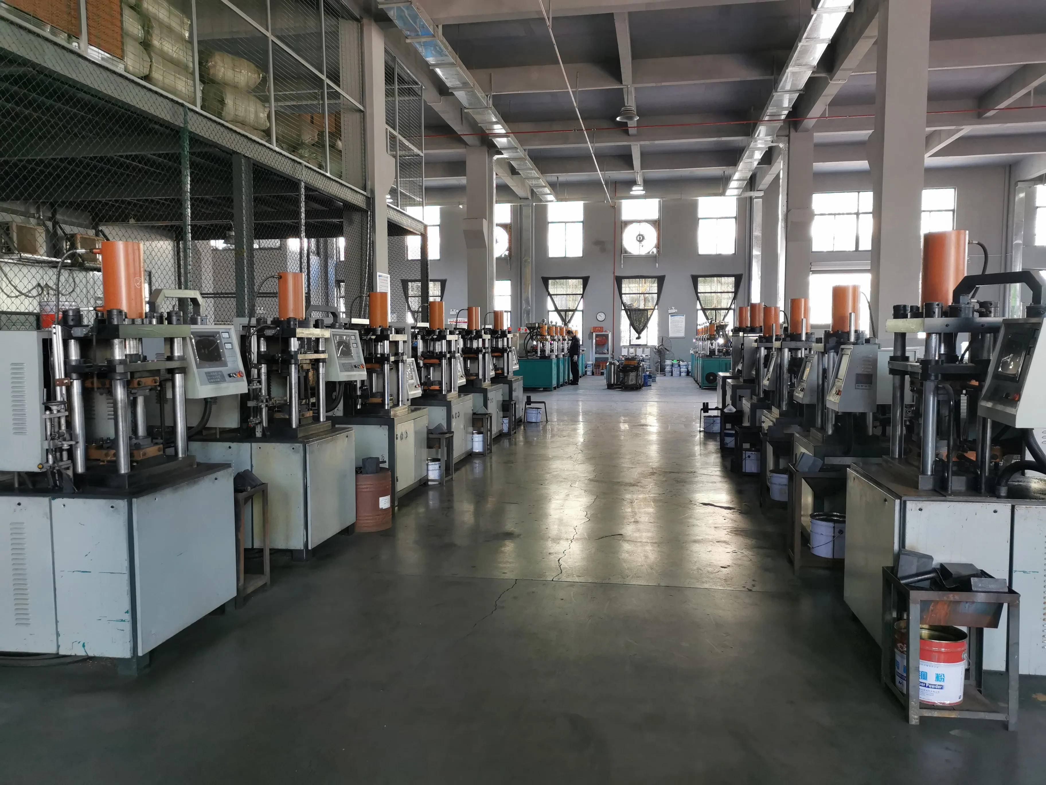 Rows of production equipment inside the factory workshop
