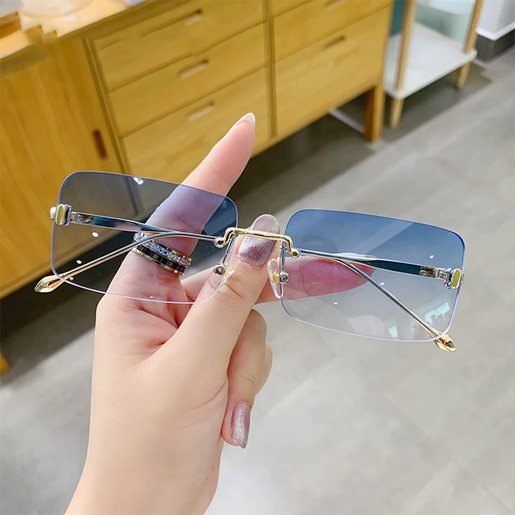

Wholesale Fashion Rimless Eyeglasses Square Metal Gradient Clear Lens Gafas de sol Women Shade Sunglasses, 7 colors