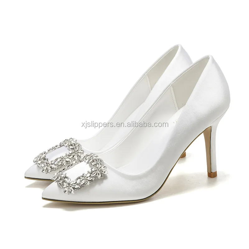 white pointed wedding shoes