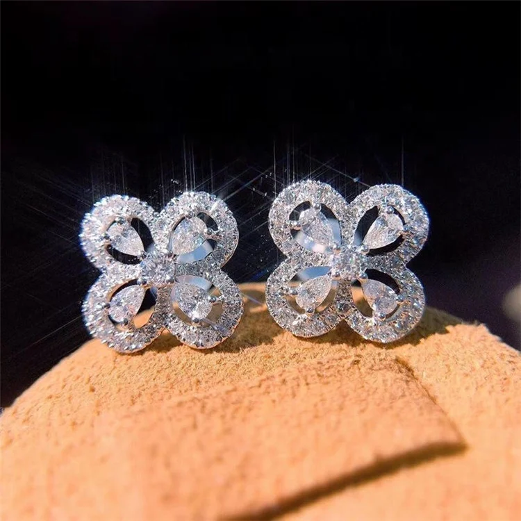 

Fashion Hollow Four Leaf Clover Stud Earring Flower Design with Oval Shape Zircon Earring for Women Wedding Jewelry