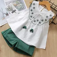 

Children's sleeveless lotus leaf collar floral top with solid color shorts 2 piece children's clothing