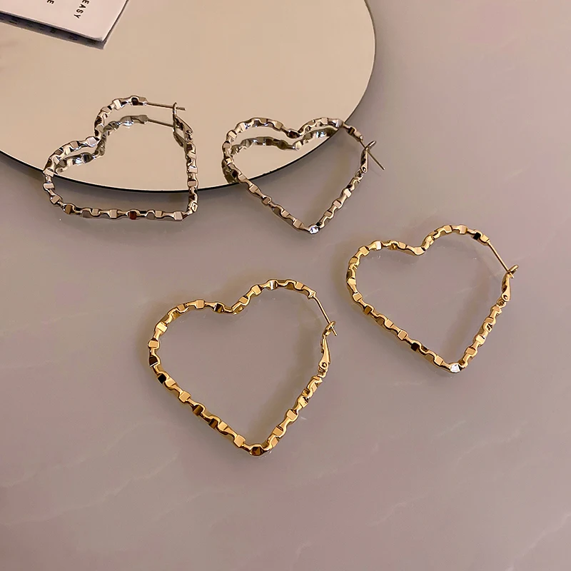 

fashion heart shape twisted earrings gold plated