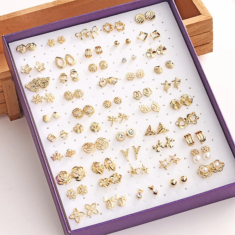 

Korean Version of 50 Pairs of Boxed Mixed Batch of Small Gold Earrings Fashion Hollow Diamond Hypoallergenic Earrings Wholesale, Gold white