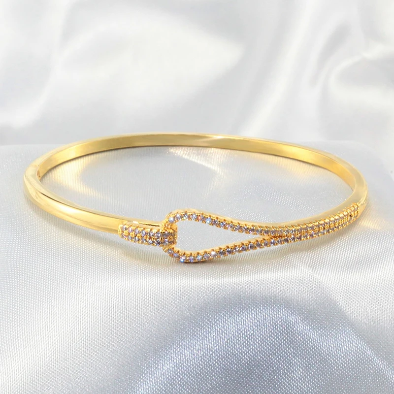 

Ruidi Bangles And Bracelets Gold Plated Rhinestone Knot Bracelet