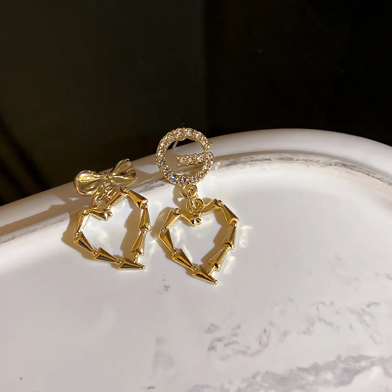 

trendy fashion gold plated heart earrings cz drop