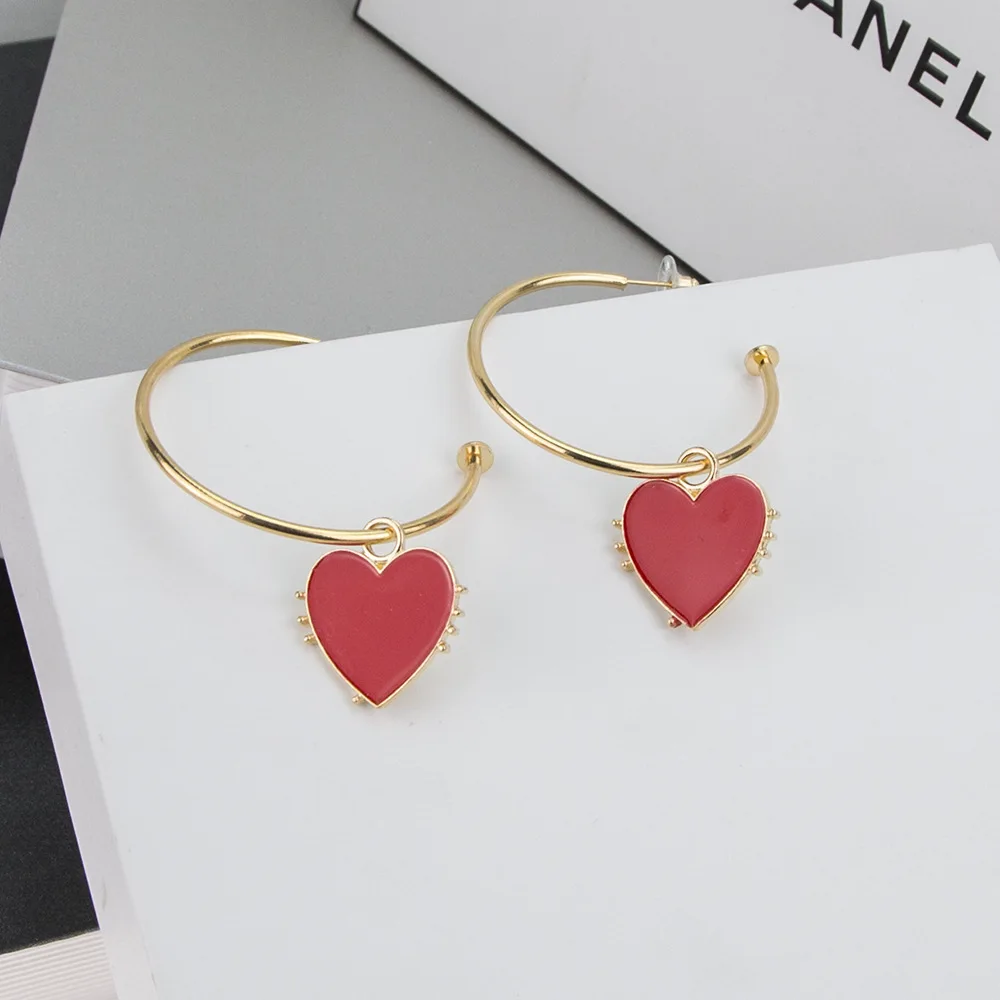 

Hot-selling simple heart-shaped earrings personalized open ladies hoop earrings, Gold