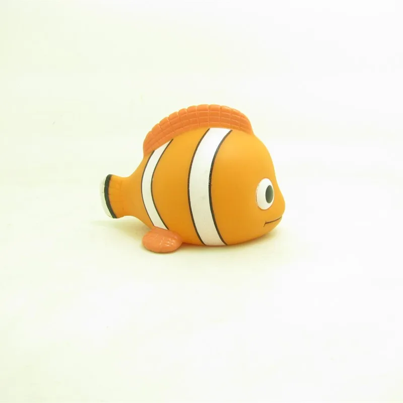 Baby mini floating showering squeeze squeaky fish Toys