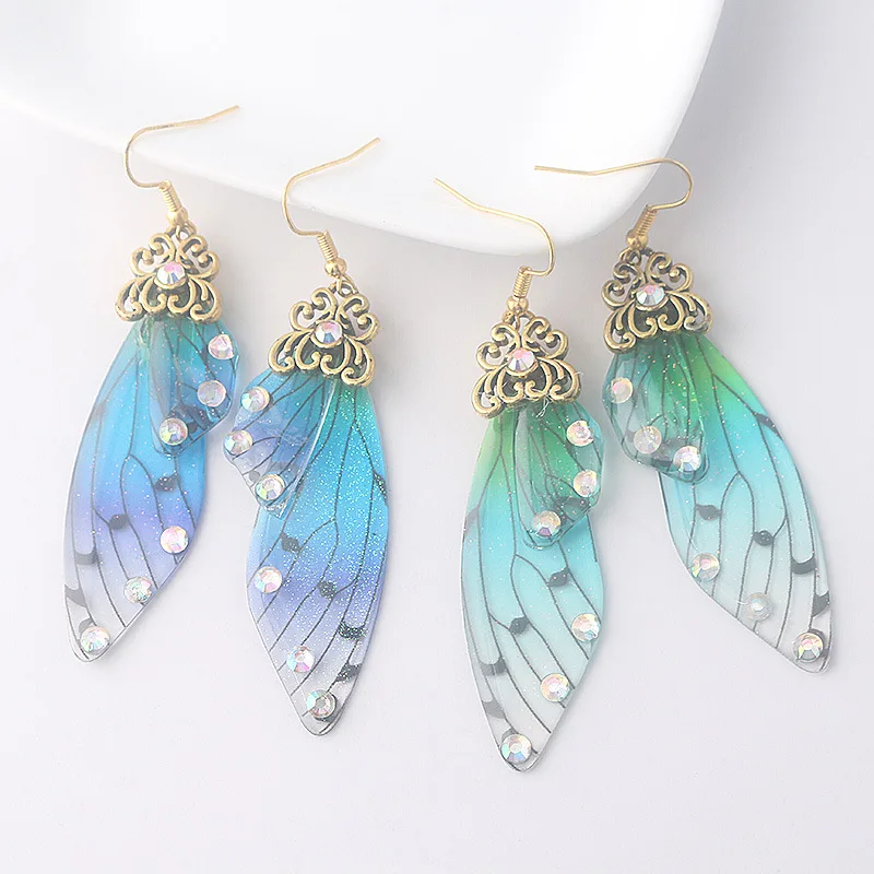 

Handmade Beautiful Butterfly Earrings Resin Insect Wing Drop Earrings Foil Rhinestone Earrings for woman, Picture shows