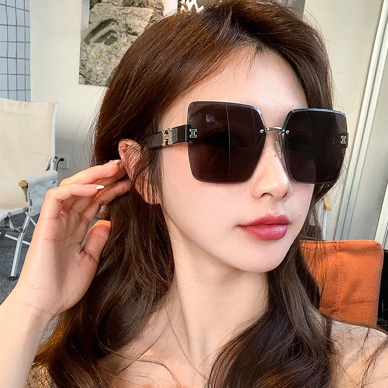 7710 2023 new trend H type  frameless sun glasses outdoor travel Anti-UV shades Oversize unisex rimless sunglasses