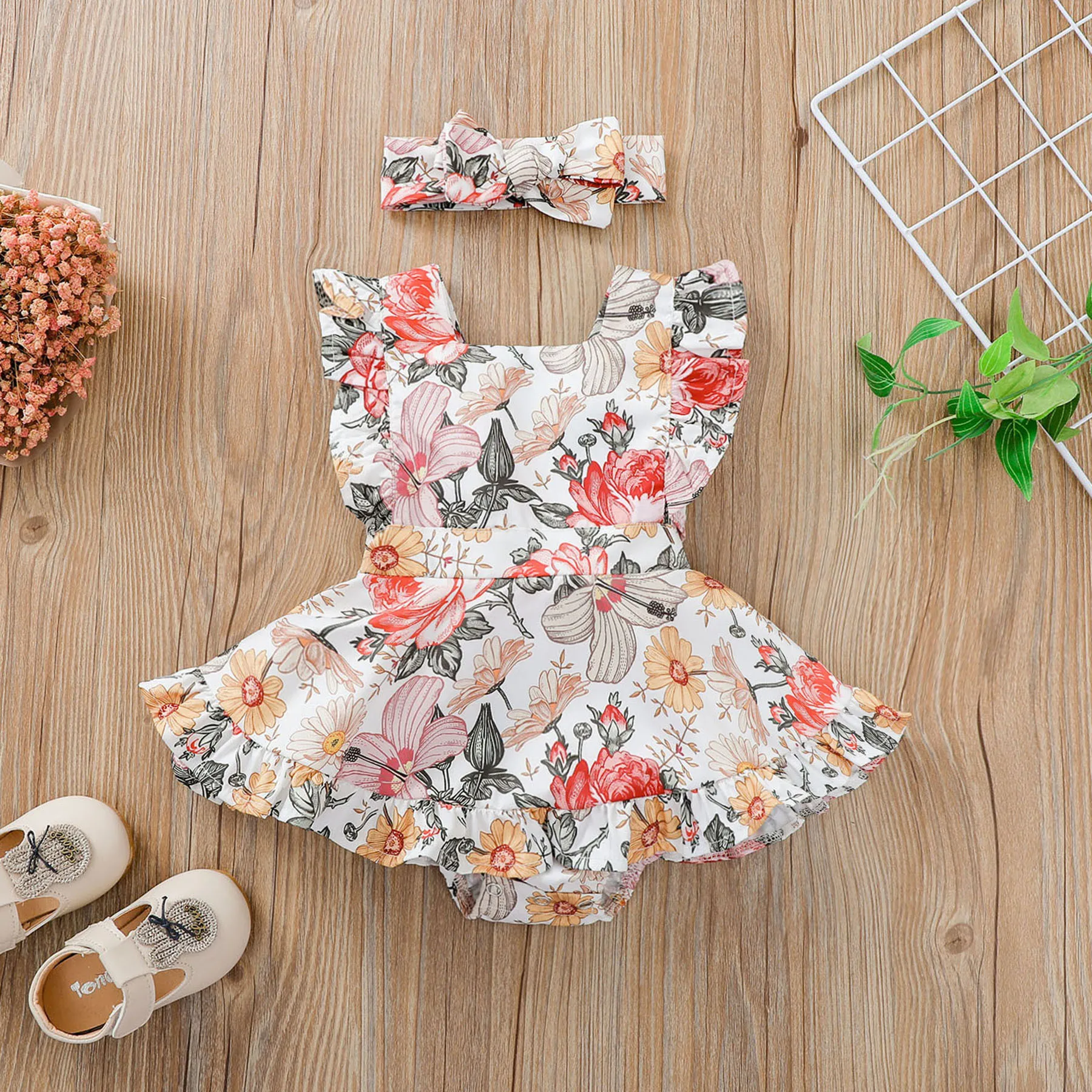 

Wholesale newborn Baby girls dress jumpsuit ruffled floral printed sleeveless rompers and headband for babies, Picture shows