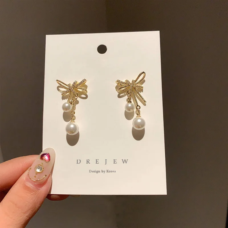 

fashion trendy gold plated pearl bow drop earrings