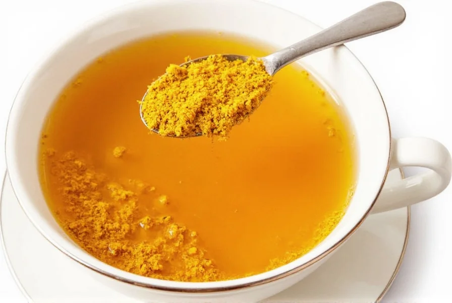 Ingredients for making turmeric tea including fresh turmeric root, black pepper, and lemon