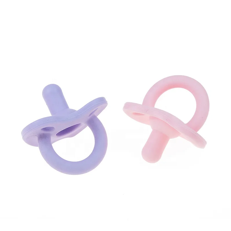 

Eco-friendly Baby Sleep Soother Infant Nipple Retractable baby silicone ring pacifier