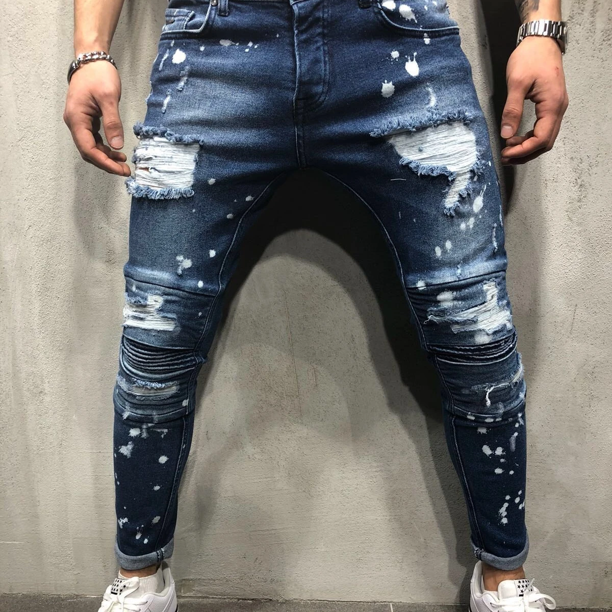 

D Hot selling hip-hop style slim-fit breathable ripped holes folds little feet men's jeans trend Jeans