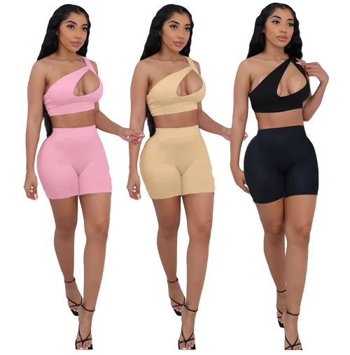 

2022 Summer Sporty Casual Solid Workout Suits Inclined Shoulder Hole Sleeveless Vest stretchy Shorts 2 Piece Set Women