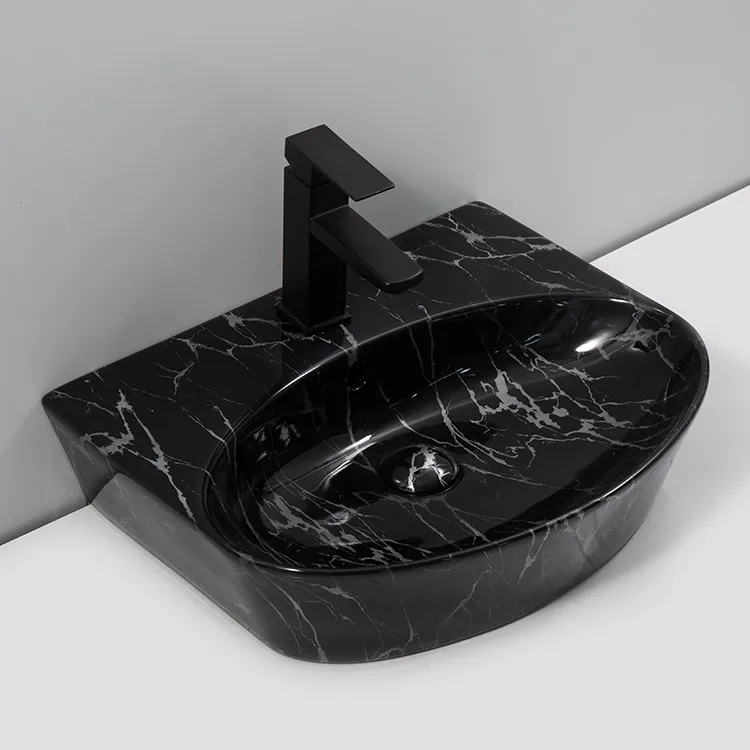 black-marble-bathroom-sink-9757B-P-226-angled-view-D-shape-flat-back-oval-bowl-integrated-tap-deck-black-marble-vein