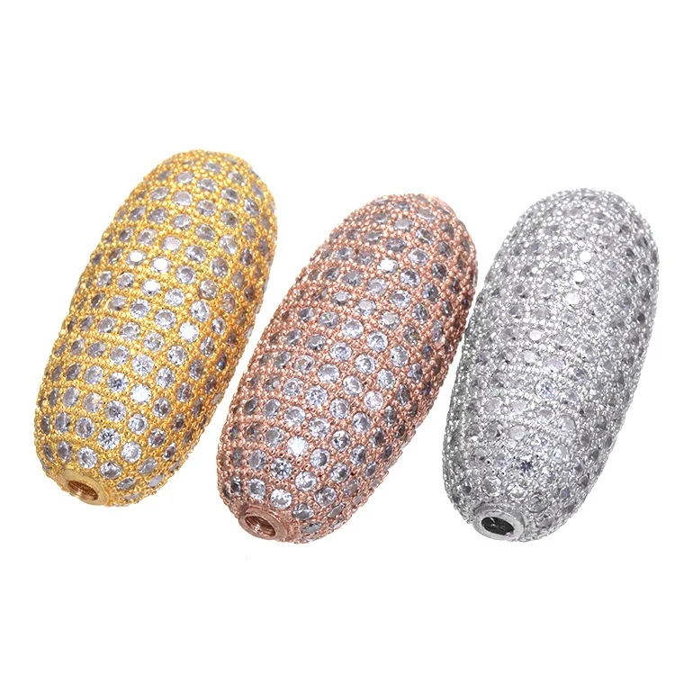 

CZ Micro Pave Oval CharmBall Space BeadsPave Cubic Zirconia Football Beads