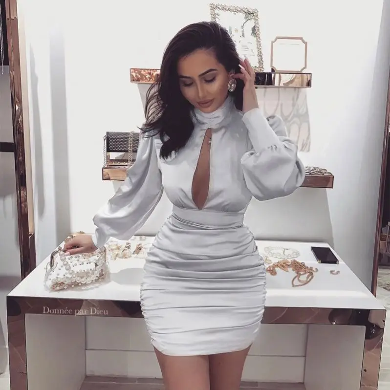

Wholesale new trend fall casual dresses women ladies elegant puff sleeve hollow out stacked bodycon silk dress, Photos show