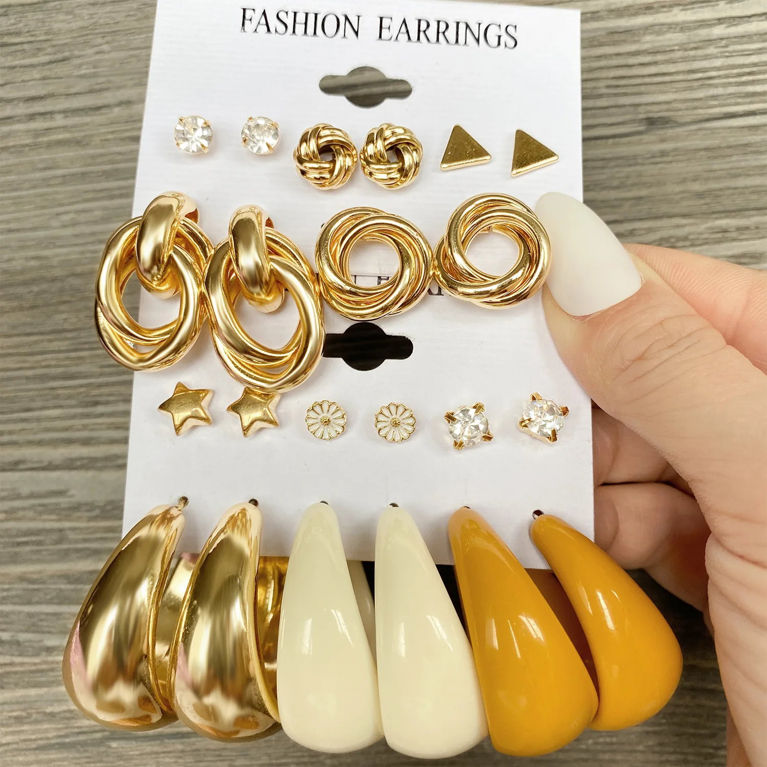 

2022 New Gold Plated Pearl Hoop Earrings Wholesale Mixed Designs Leaf Tassel Acrylic C Shaped Geometric Earrings Set for Women