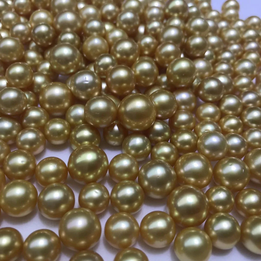 

wholesales price,10-15 mm high quality AAAA perfect round nature loose south sea dark gold pearl with half,OR no hole