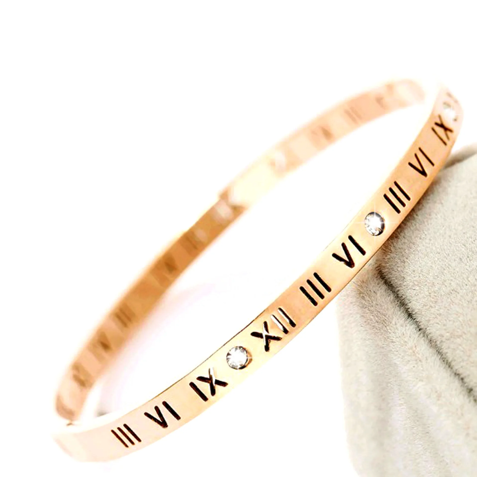 

Factory wholesale European and American creative jewelry simple hollow Roman font electroplated titanium steel bracelet