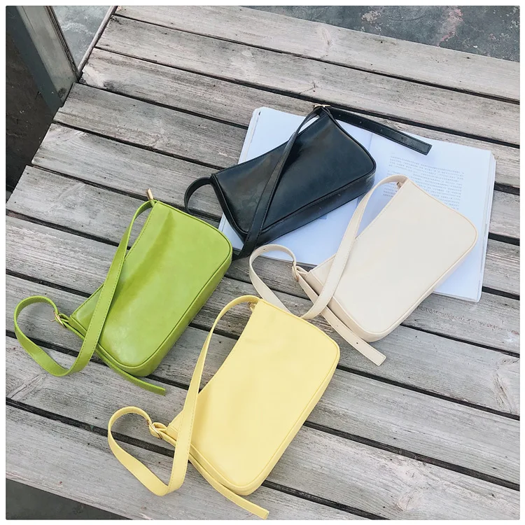 

Simple solid color PU ladies cosmetic handbags well-made mini women bags