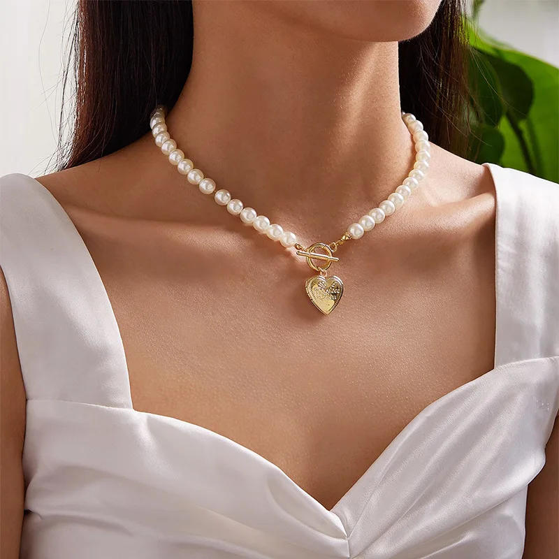 

Fashion Gold Heart pendant Pearl Necklace for women wholesale ND2105121