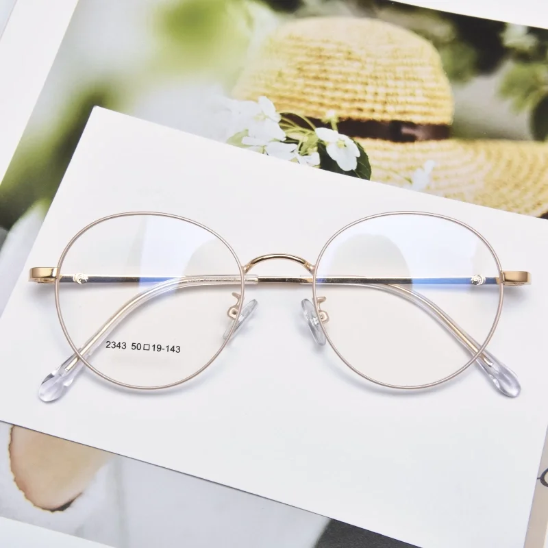 

Wholesale Clear Lens Gold Eyeglasses Frames Metal Optical Frame Gold Retro Glasses 2021