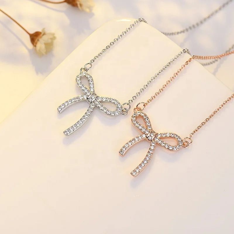 

Lady Luxury Crystal Necklace Cute Bowknot Full Stone Pendant Necklaces For Women Rose Gold Silver Color Clavicle Chain Necklace, Picture shows