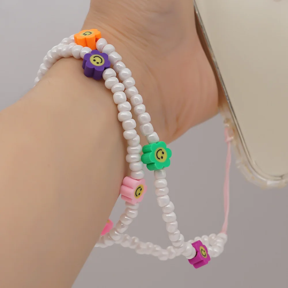 

Boho Mobile Chain Pearl Beaded Anti-lost Phone Strap Charm Handmade Soft Pottery Smiley Face Flower Wrist Phone Chain, Colorful