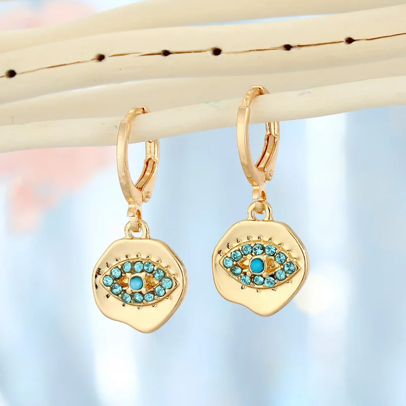 

2021 Sailing Jewelry Fashion Female Irregular Round Rhinestones Demon Blue Eyes Earrings Small Devil Earrings
