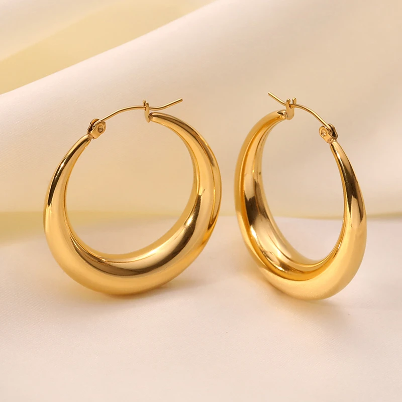 

Minimal and classic gold big hoop earrings 18K gold plated Stainless Steel In Hollow Oval Hoop earrings