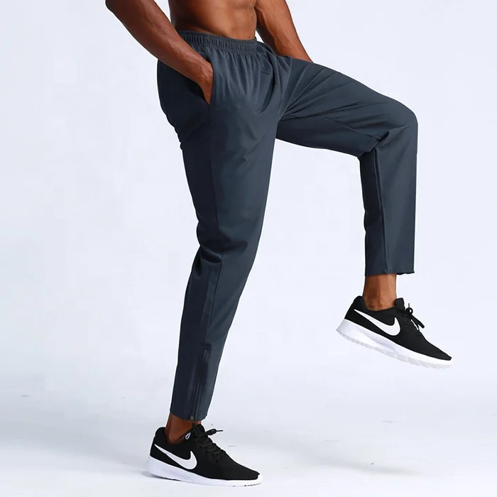

GYM Sports Workout Premium Solid Low Moq Quick Dry Zipper Leg Opening Nylon Track Pants Men