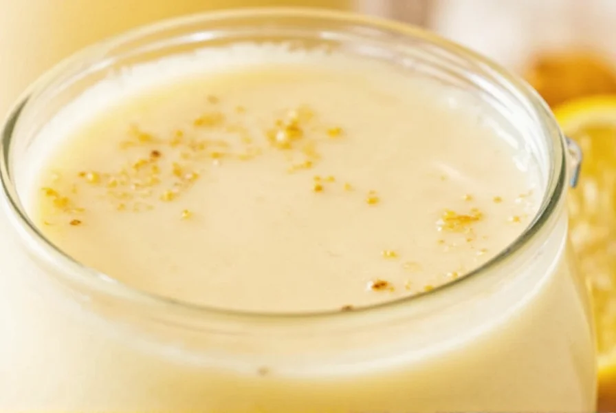 Frothy golden milk latte in a ceramic mug