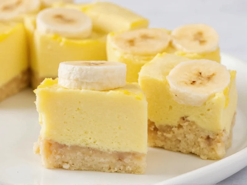 Sliced homemade banana pudding showing perfect custard layers and banana slices