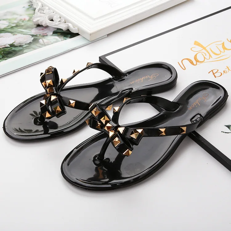 

Summer New Style Cool Slippers Flat With Bow Rivet Slippers Women's Flip-flops Garden Jelly Beach Cool Slippers, Picture