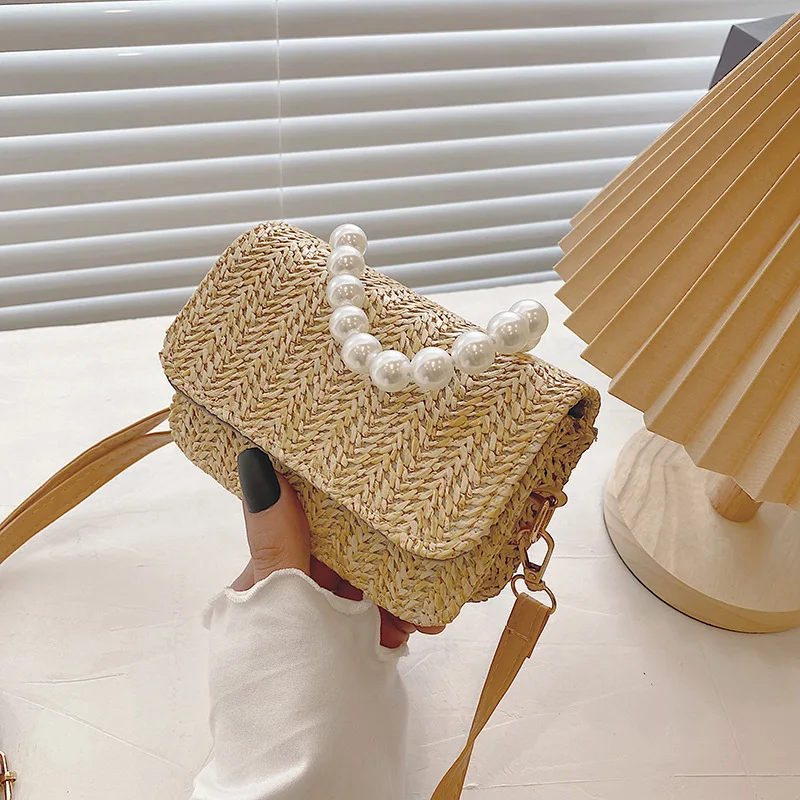 

Wholesale Fashion Design Leisure Pearl Handbags Ladies Summer Woven Beach Straw Small crossbody shoulder bag Women Hand bags, 2 colors