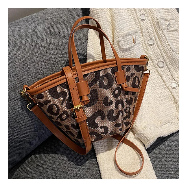 

Large Capacity Ins 2021 Leopard Vintage Canvas Bucket Handbags Fashion Designer Knot Luxury Handbags For Women Sac a Main Femme
