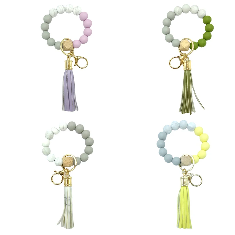 

2021 Newest Designs Silicone Beaded Key Ring Leather Tassel Wristlet Bangle Bracelet Keychain For Women, Customized color