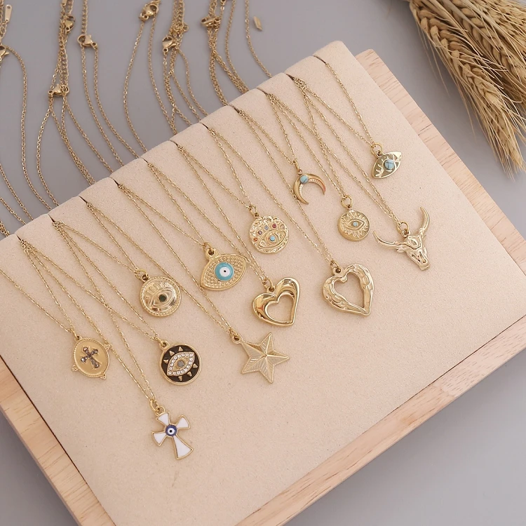 

G424 Fashion Jewelry Wholesale Star Hollow Out Heart Pendants Charms Blue Eye Bull Head Moon Women Necklace