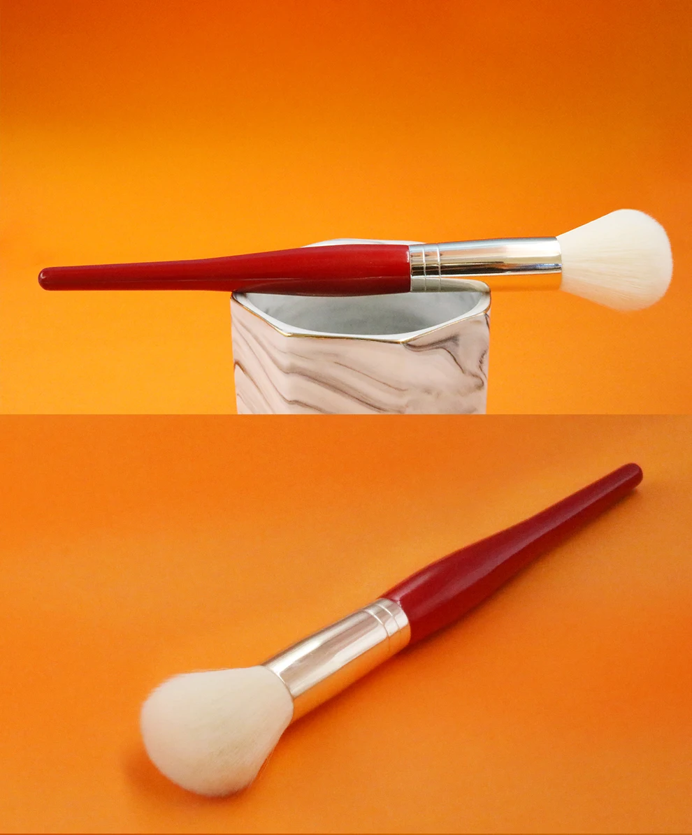 Red makeup brush