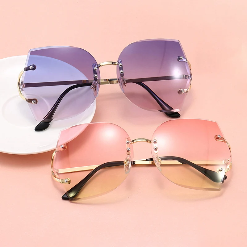 

Superhot Eyewear 44800 Fashion 2020 Women Sun glasses Elegant Lady Oversized Rimless Sunglasses