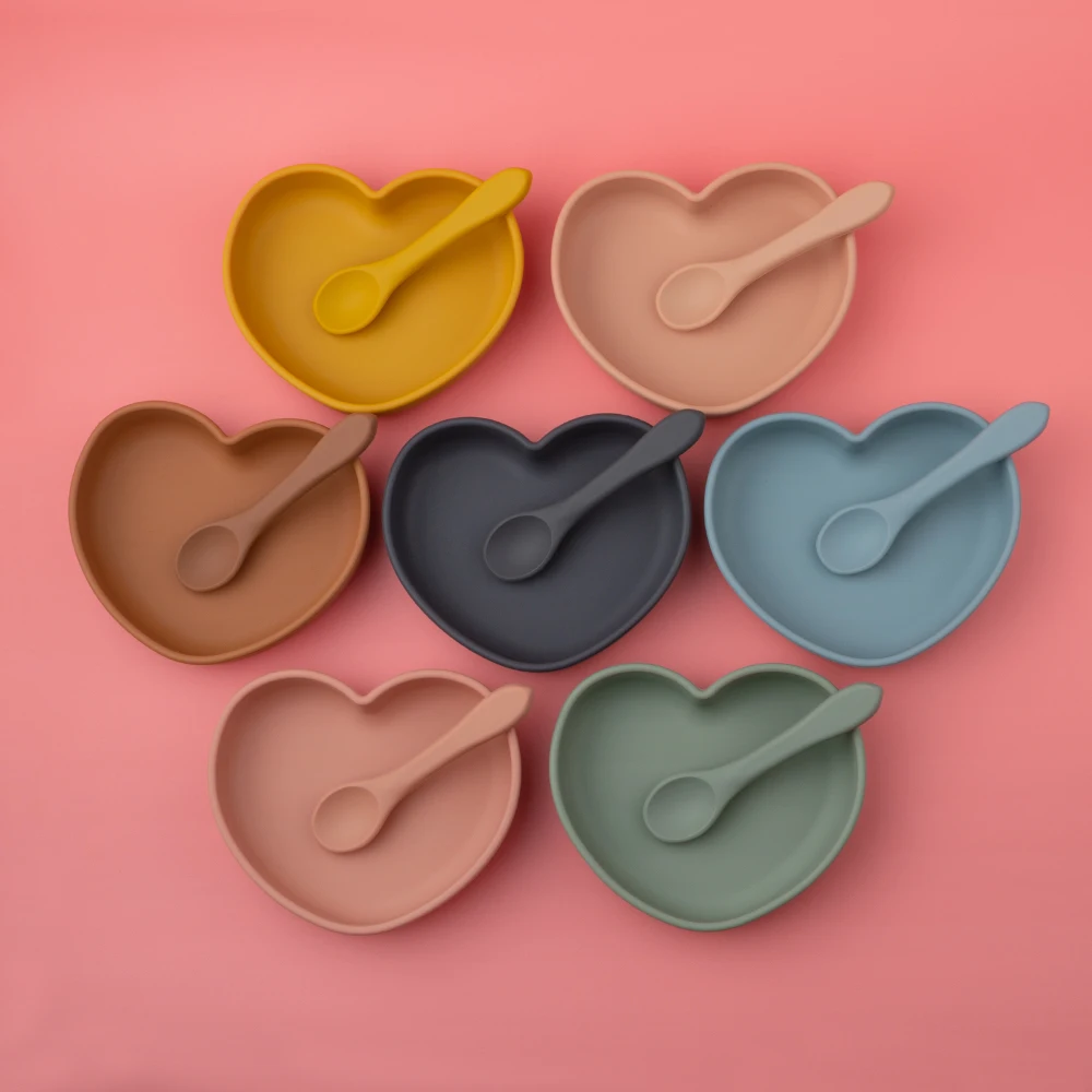 

Eco-Friendly Food Grade Silicone Heart Shaped Professional Feeding Silicone Plate Set With Spoon, Muted,mustard,apricot,clay,dark grey,sage,ether etc.