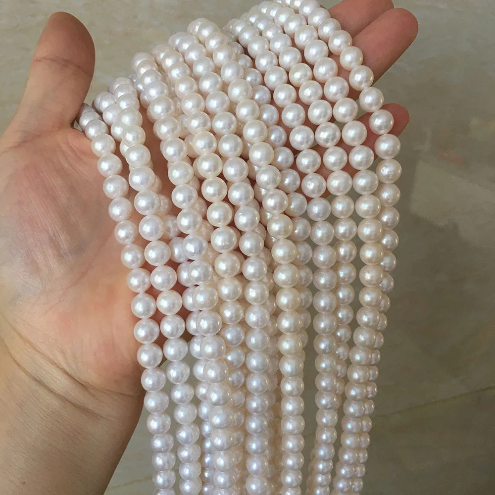 

100% FRESHWATER PEARL,7 mm AA+ good quality perfect round shape pearl in strand loose wholesale freshwater pearl few flaw