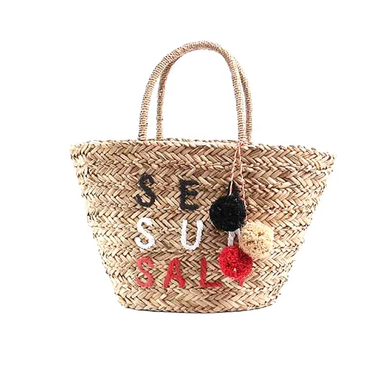 

Natural degradable hand braided bucket shape straw beach tote hand bags with ebroidery and pompom balls for young girls